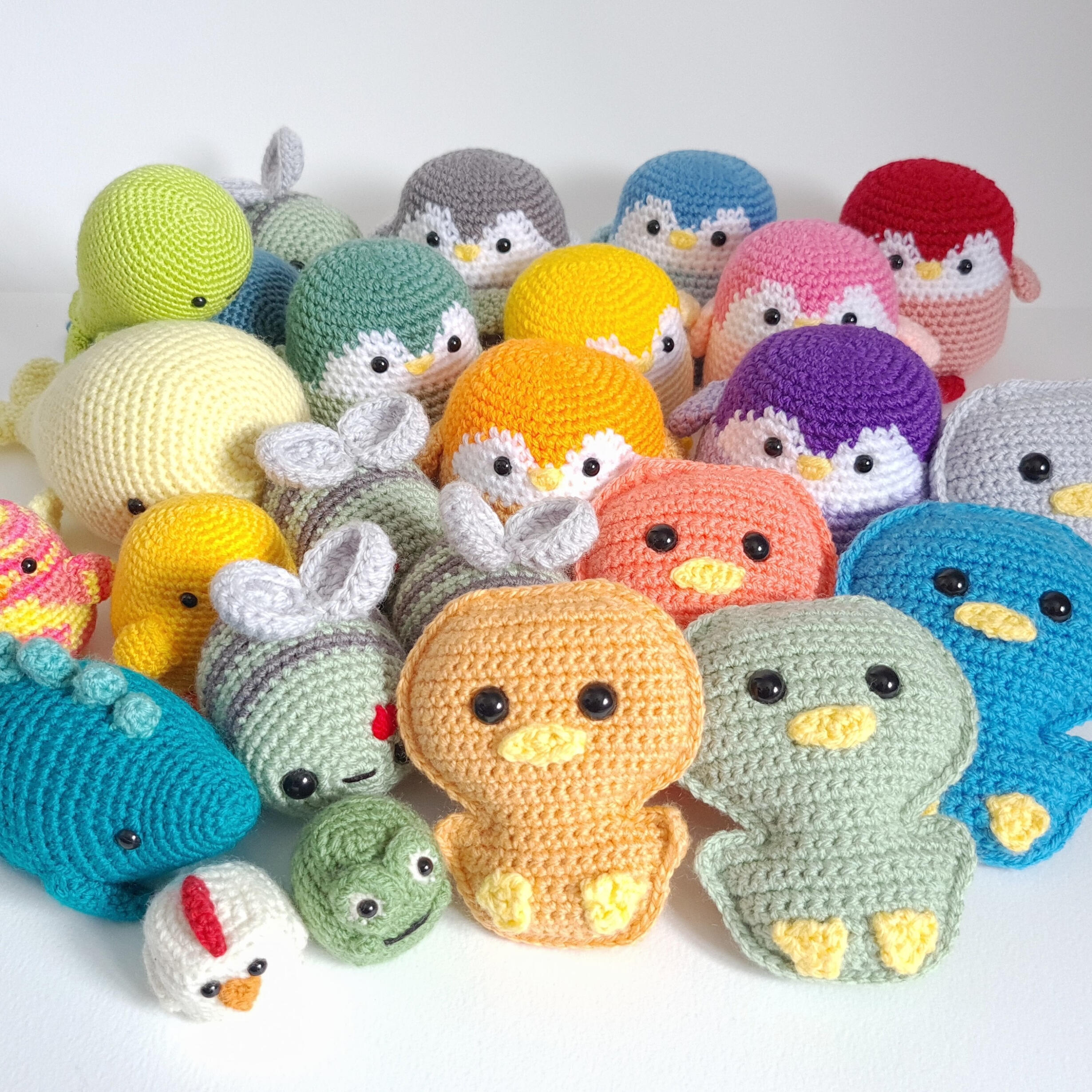 A collection of crocheted animals and foods